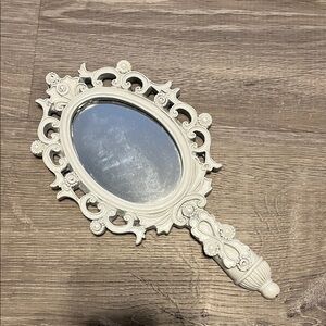 vintage hand mirror wall-hanging